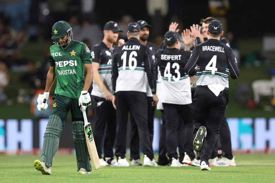 Hasan Nawaz walks away as New Zealand celebrate the early wicket