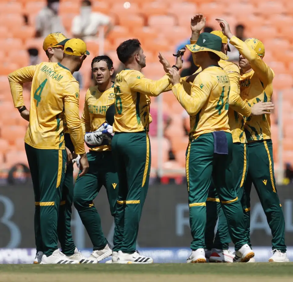 The South Africa team is celebrating after the wicket The South Africa team is celebrating after the wicket